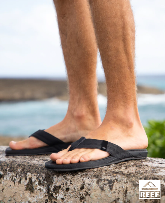 A man wearing Cushion Bounce sandals from Reef– Bikini Village